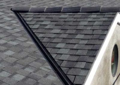 Roof peak shingles installed by Gotcha Covered Roofing Company